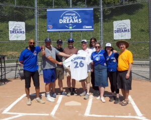 Members of the TPBA Board of Directors and TPBA officials were all smiles after receiving a commemorative Toronto Blue Jays jersey following the Jays Care Ribbon Cutting Ceremony for the Revitalization of Christie Pits Diamond 2.