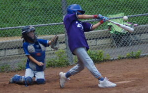 Kaden (14) strokes a single that allowed the Cubs to load the bases in the bottom portion of the third inning.