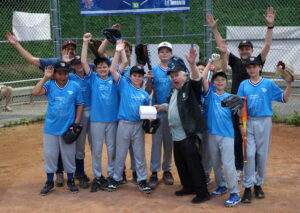 The TPBA House League Baseball 13U Peewee Division Brewers whoop it up after receiving a box of treats from the Harbord Bakery, the team's sponsor.